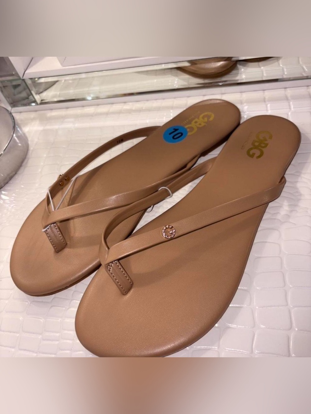 G by Guess Nude Tan Thong Sandals with Gold Logo Charm